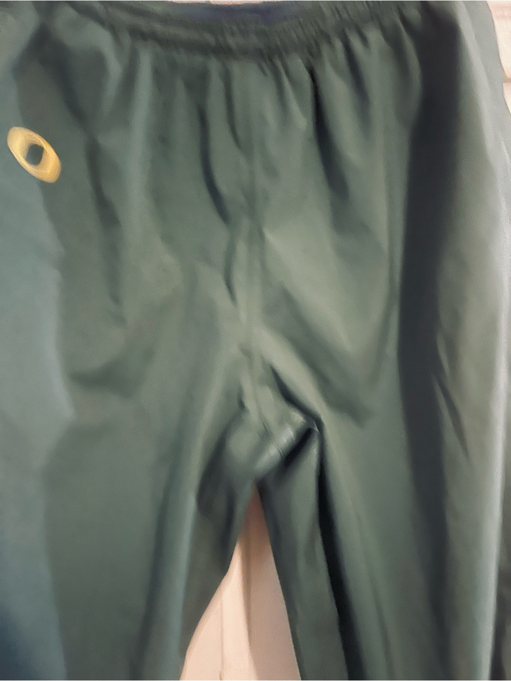 Green Oregon Rain Pants with Gold Logo